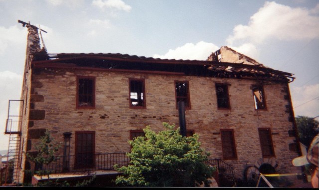 The view of the mill building the day after the Knittery Fire, Cambridge Road, 1999