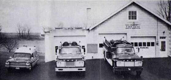 The company in the early 1970's. 1964 Cadillac (our 3rd ambulance), 1961 Tanker, 1968 pumper